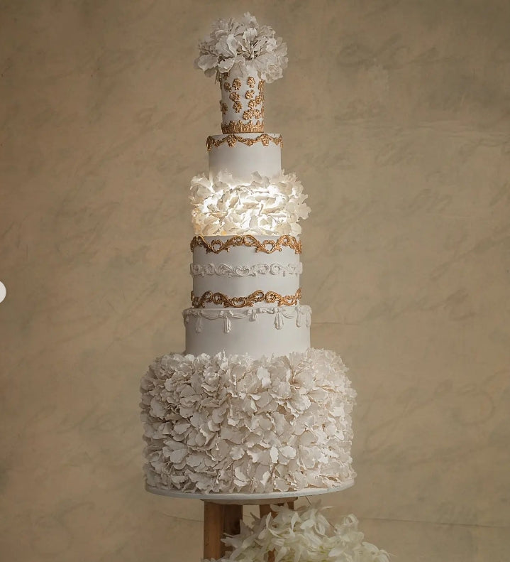 our wedding cakes are handcrafted to reflect you — your style, your story, your day. Each bite is a celebration of love, made with care, detail, and a touch of magic.