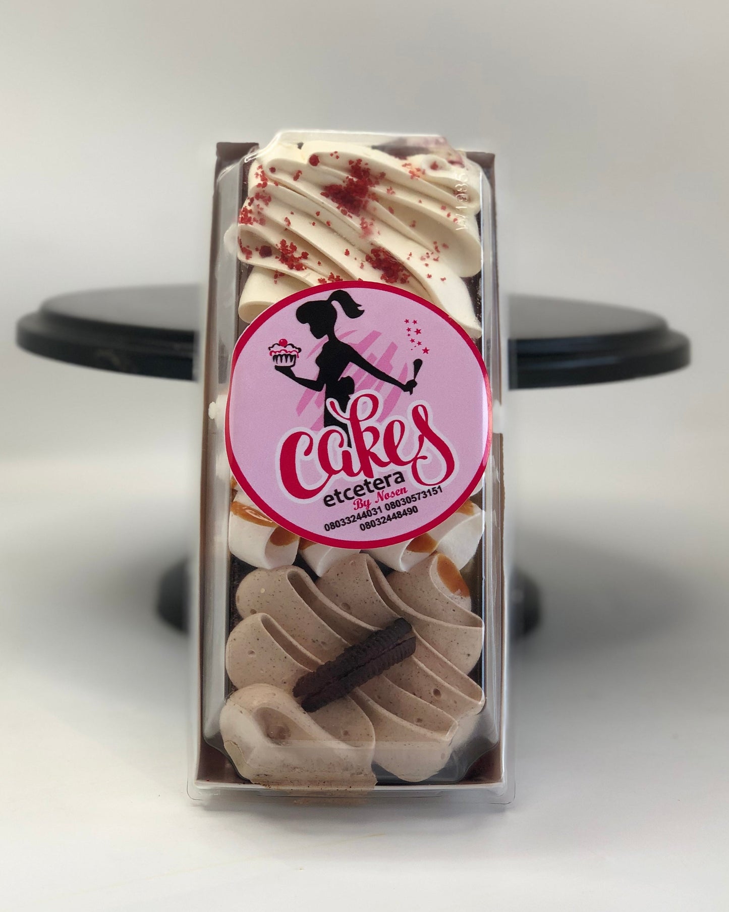 Packaged cake slices with a 'Cakes Etcetera' logo on a white background